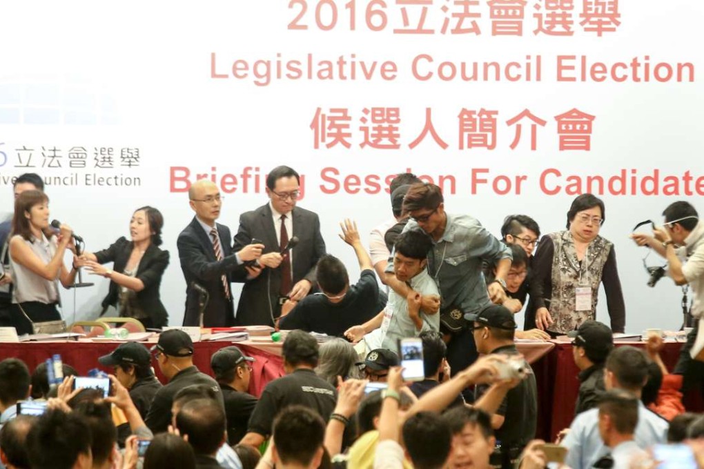 Pan democrats protested during 2016 Legislative Council General Election candidates' briefing at Kowloon Bay International Trade and Exhibition Centre. Photo: David Wong