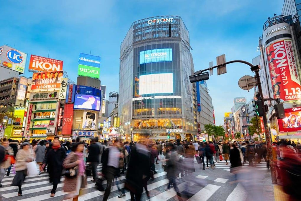 Evening rush hour at the Shibuya Crossing in Tokyo.