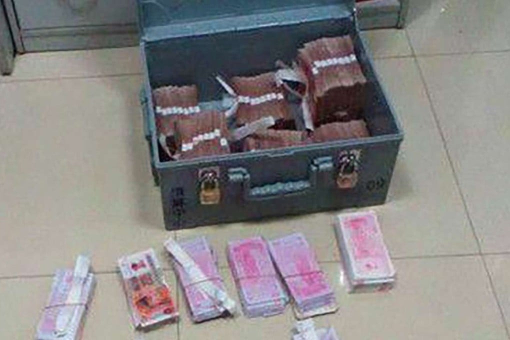 A bank clerk replaced cash he stole with “spirit money”, at front. Photo: SCMP Pictures