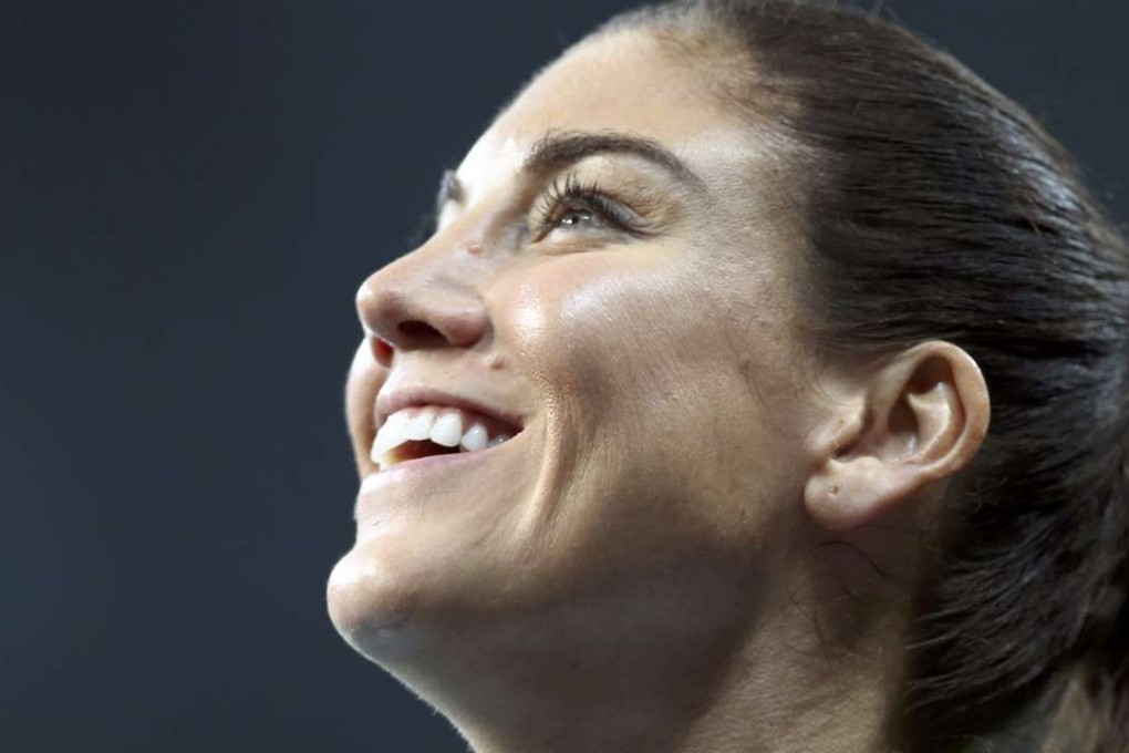 Hope Solo (USA) of United States of America smiles after the match. REUTERS/Mariana Bazo