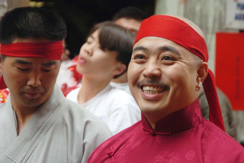 In this August 6, 2006, file photo, Raymond Shrimp Boy Chow smiles after being sworn in as the Dragon Head of the Chee Kung Tong in Chinatown in San Francisco. Photo: AP