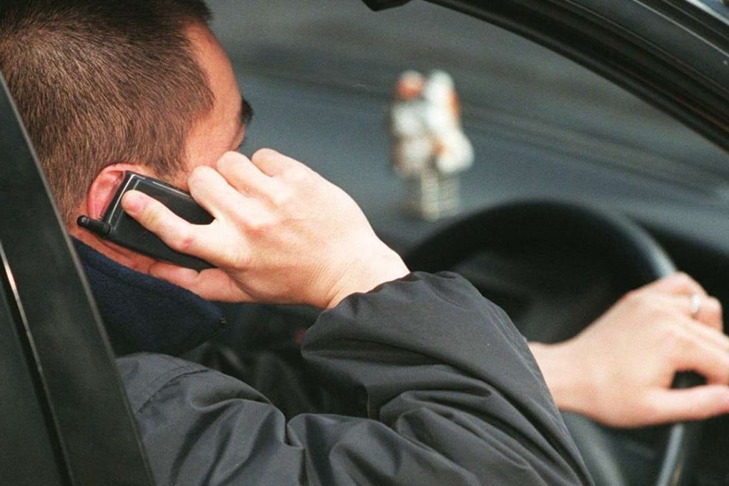 It is already illegal for drivers to use mobile phones. Photo: SCMP Pictures