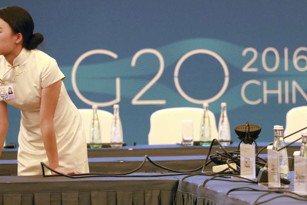 A hostess prepares for the G20 finance ministers’ meeting in Chengdu, Sichuan, last month. Hangzhou city will host the summit next month. Photo: AP