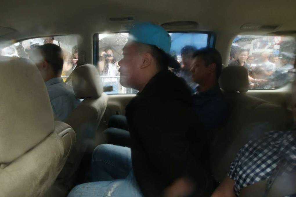 Police arrest a man on Wednesday over the online abuse. Photo: David Wong