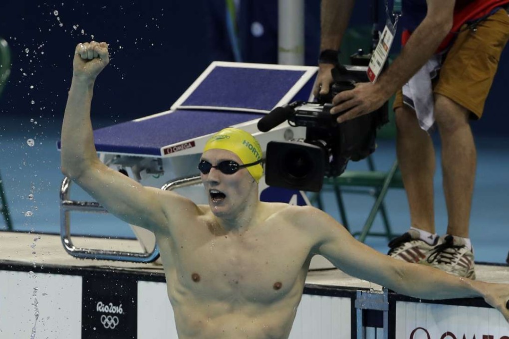 Australia's Mack Horton celebrates winning the gold in the final of the men's 400 metre freestyle. Photo: AP