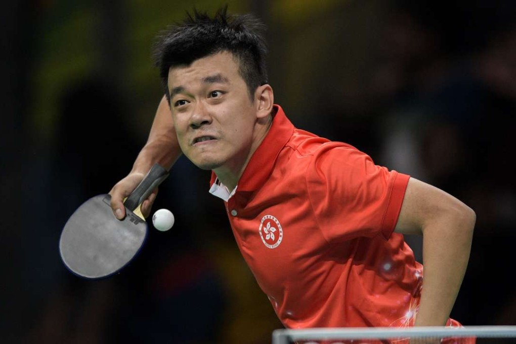 Hong Kong's Tang Peng serves in his men’s singles third round loss to Hugo Calderano. Photo: AFP