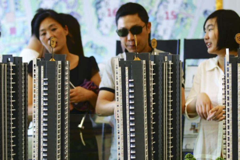 Fitch says China needs to build 800 million square metres of residential space per year, the size of Singapore, until 2030 to meet demand. Photo: Imaginechina