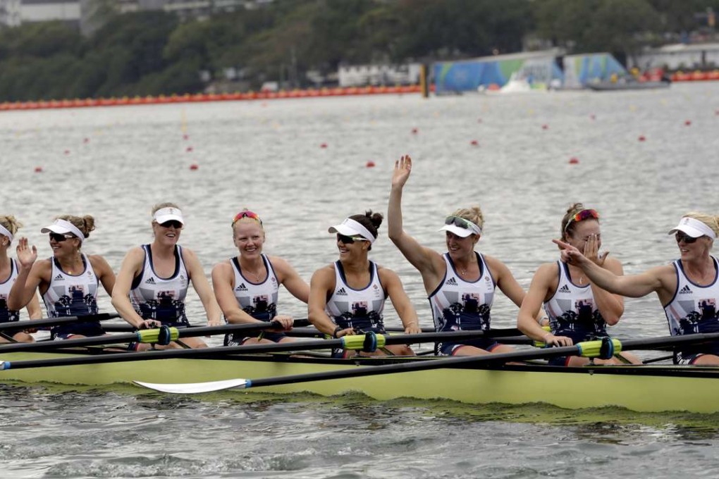 The Great Britain women’s eights crew, including Melanie Wilson (second left) celebrate after winning their heat at the Rio Games. Photo: AP