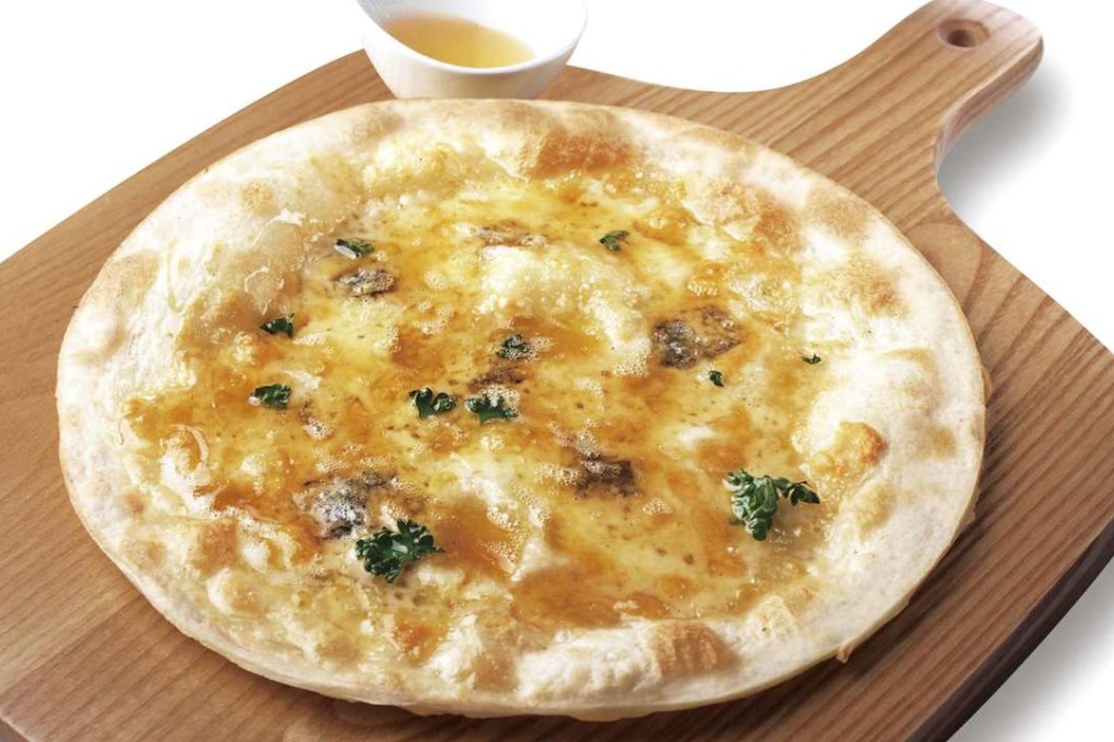 Honey and cheese pizza by Ufufu Cafe in Tsim Sha Tsui.