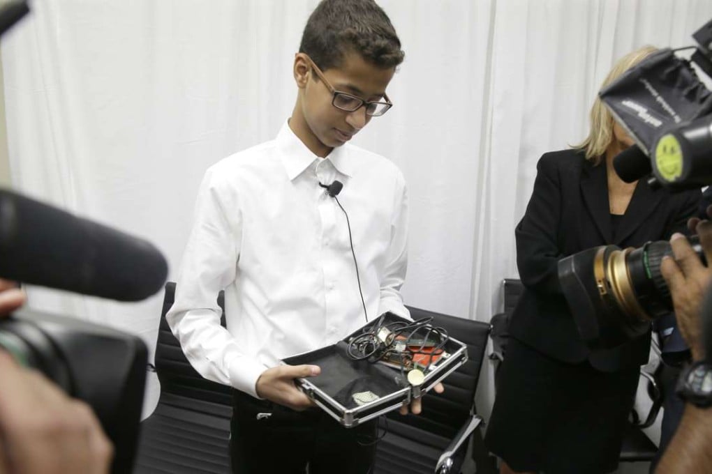 Ahmed Mohamed shows the ‘clock’ he built to reporters. His family has filed a federal lawsuit against Texas school officials and others. Photo: AP