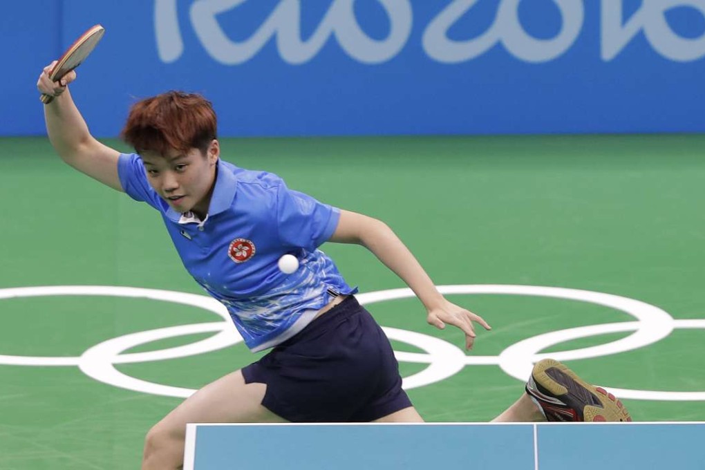 Hong Kong’s Doo Hoi-kem playing against Ding Ning of China. Photos: AP