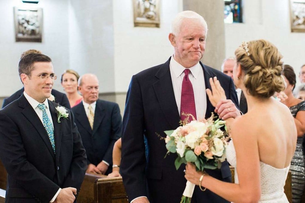 Bride Jeni Stepien touches Arthur Thomas' chest where her father's heart is beating, as her husband-to-be, Paul Maenner, looks on. Photo: Lauren Renee Designs