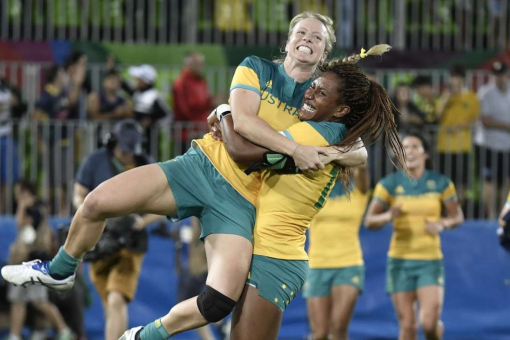 Australia celebrate winning the women’s rugby sevens gold medal match against New Zealand. Photo: AFP