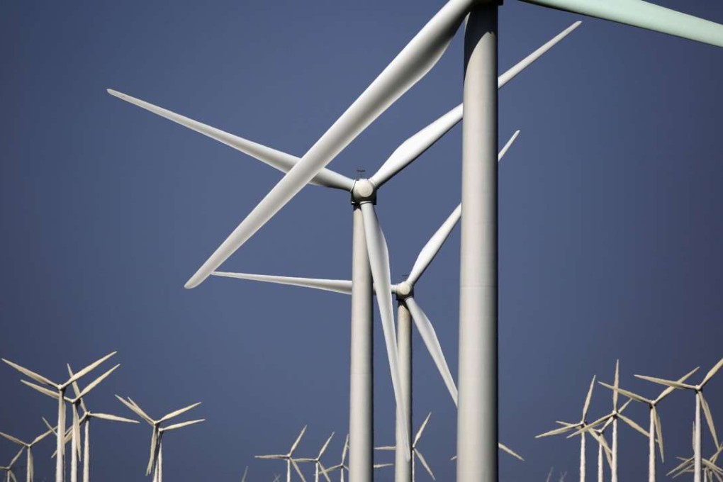 Wind turbines for generating electricity are seen at a wind farm in Gansu province, one of the worst regions for excess supply. Photo: Reuters