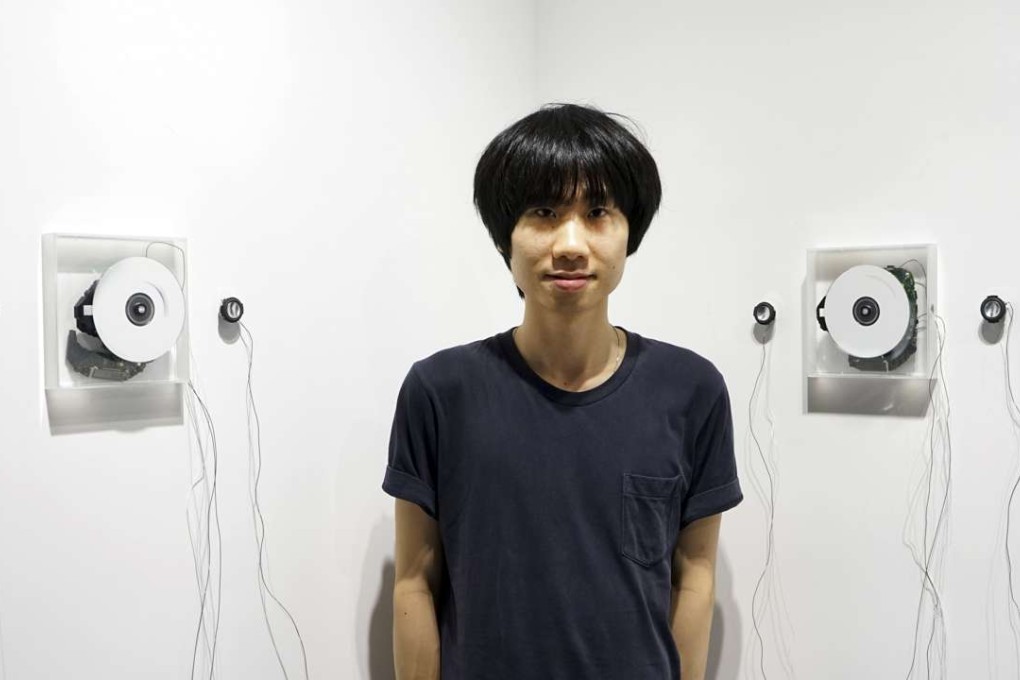 Lee Siu-hin with his installation |·o·||·o·||·o·||·o·||·o·||·o·|, at this year’s First Smash Art Project at Art Experience Gallery.