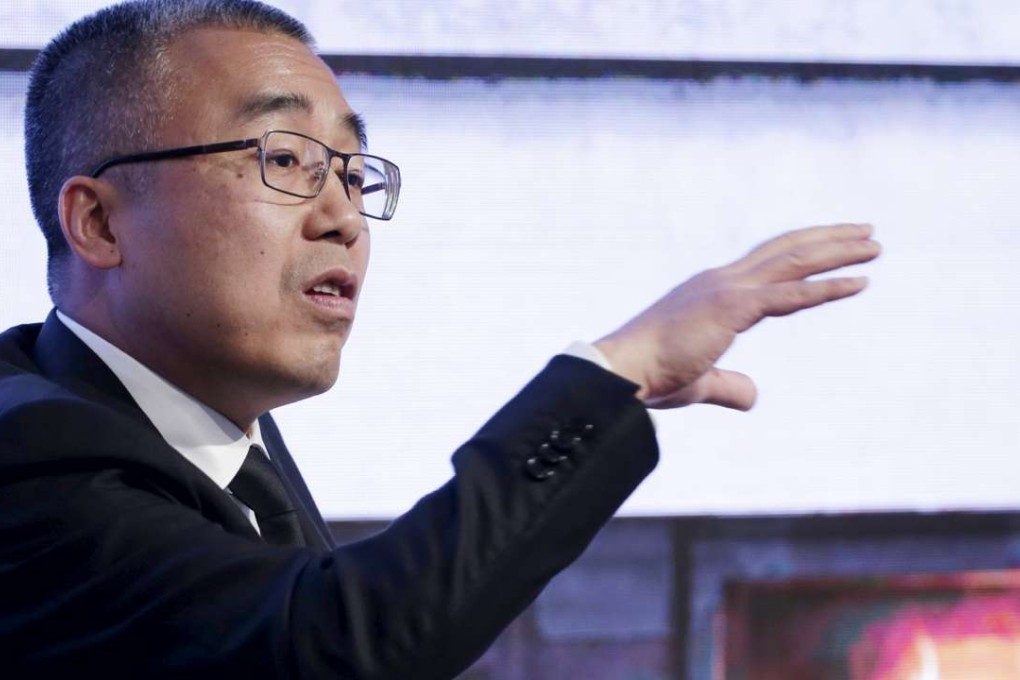 Li Ruigang speaks during a session at the World Economic Forum in Dalian last September. Photo: Reuters