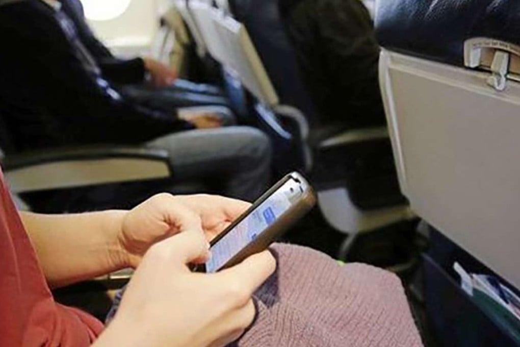 Many disputes between flight passengers and crew members occur because passengers refuse to switch off their mobile phones on the plane. Photo: SCMP Pictures