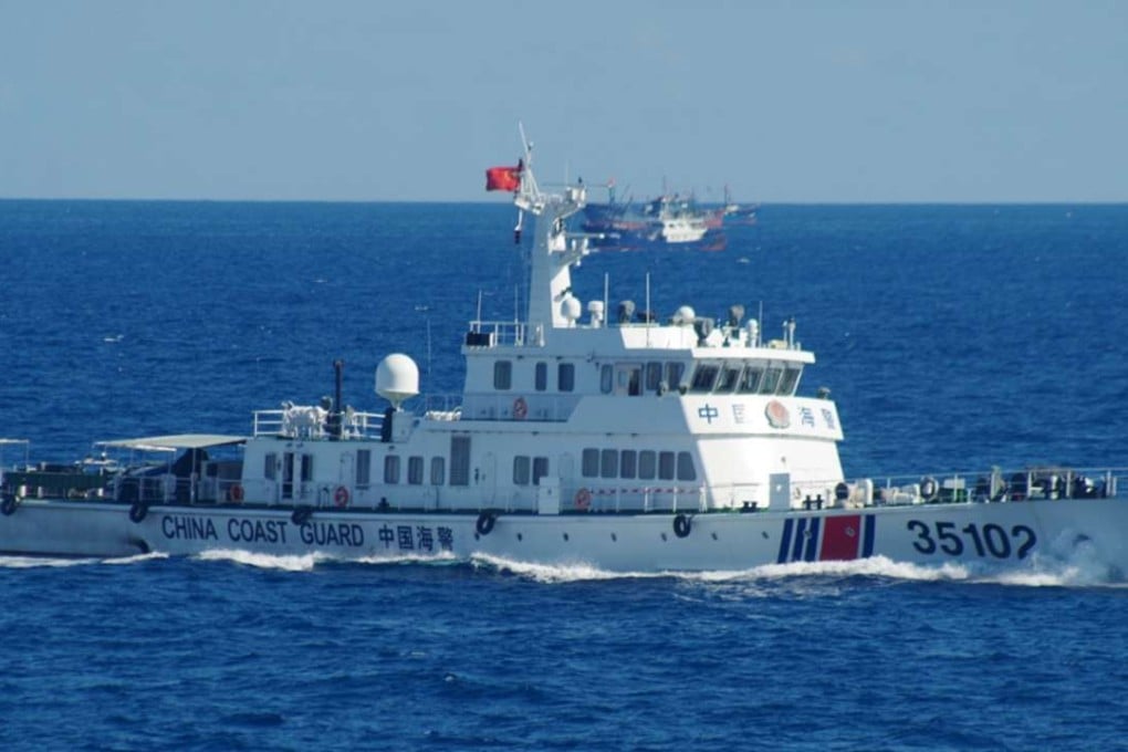 A Chinese coastguard vessel sails near disputed East China Sea islands on Saturday, in this photo released by the Japanese coastguard. Photo: AP