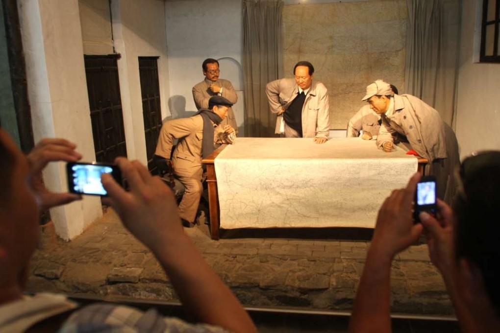Visitors take photos at the Xibaipo Memorial Museum at Xibaipo, in Hebei province. Photo: Xinhua