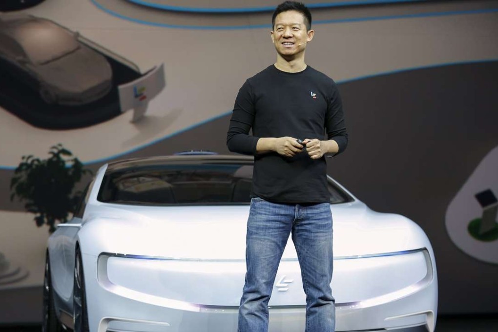 Jia Yueting, chief executive of LeEco unveils the all-electric battery concept car called LeSEE during a ceremony in Beijing, China April 20, 2016. REUTERS/Damir Sagolj