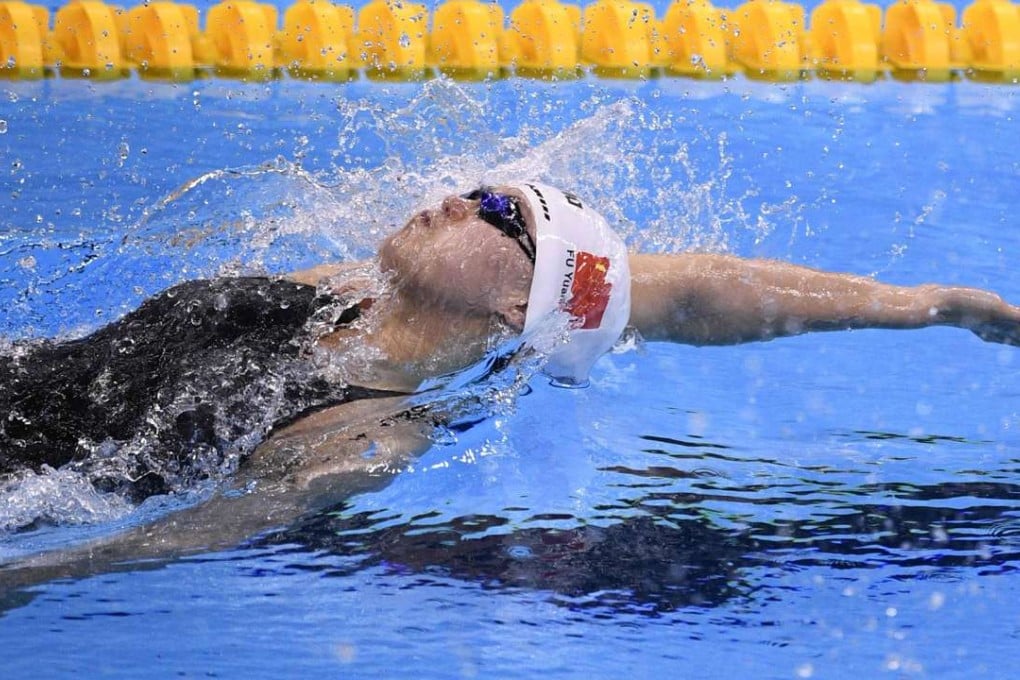 China's Fu Yuanhui in the Women's 100m Backstroke final where she won a tied bronze medal with Canada’s Kylie Masse. Photo: AFP