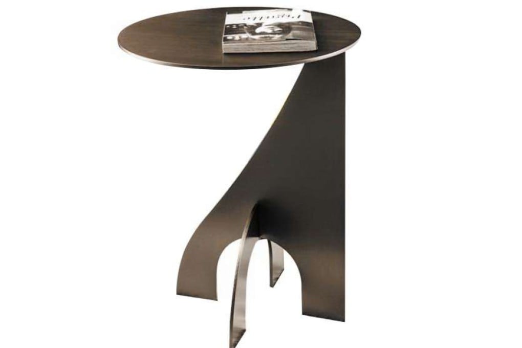 Pick one of these side tables from Aluminium, Andante, flea + cents and Ligne Roset and you won’t have to leave your couch to work, eat, play.