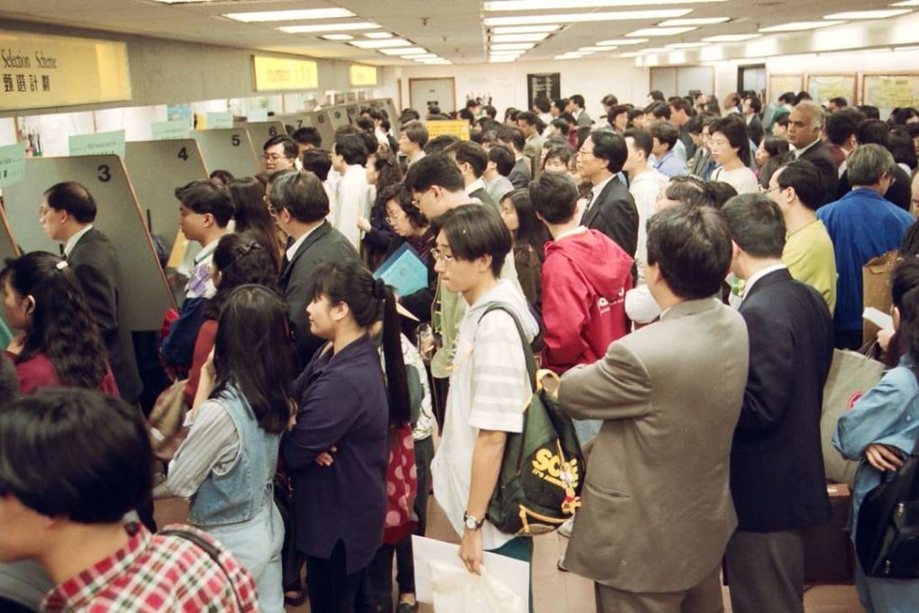 Hong Kong residents queue up in Immigration Tower, in Wan Chai, to apply for British passports before the handover. Pictures: SCMP