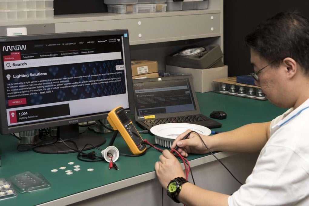An engineer works in the Arrow Open Lab darkroom at Hong Kong Science and Technology Park. The company says 120 engineers have signed up to use the facility, which opened in June, from 50 companies. Photo: SCMP Pictures