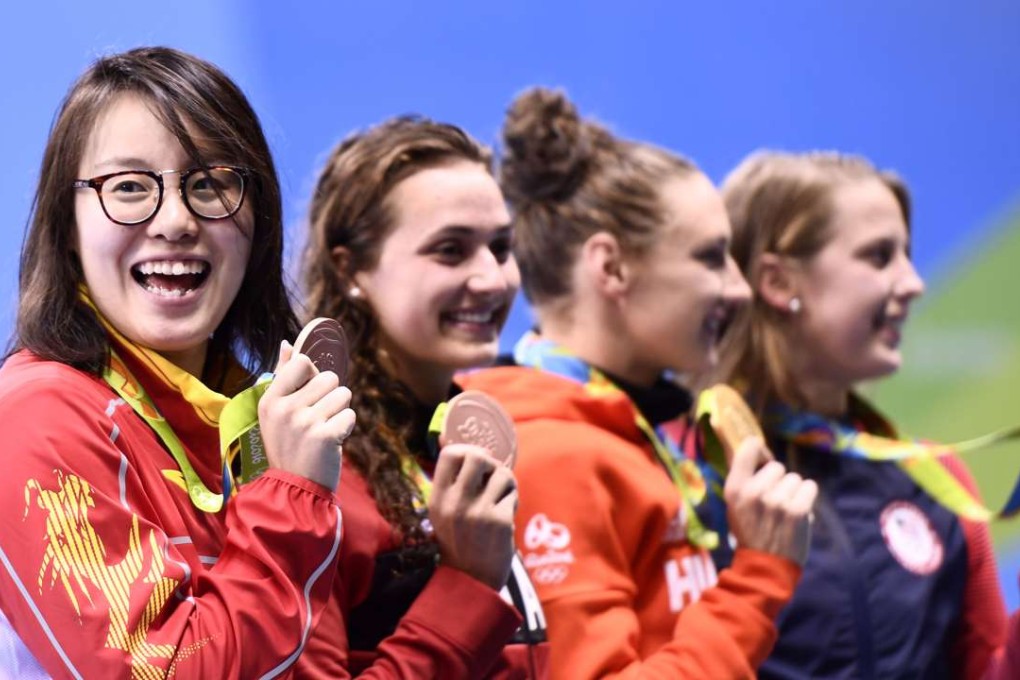 Chinese swimmer Fu Yuanhui (left) endeared herself to countless fans with her hilarious post-race reactions. Photo: AFP