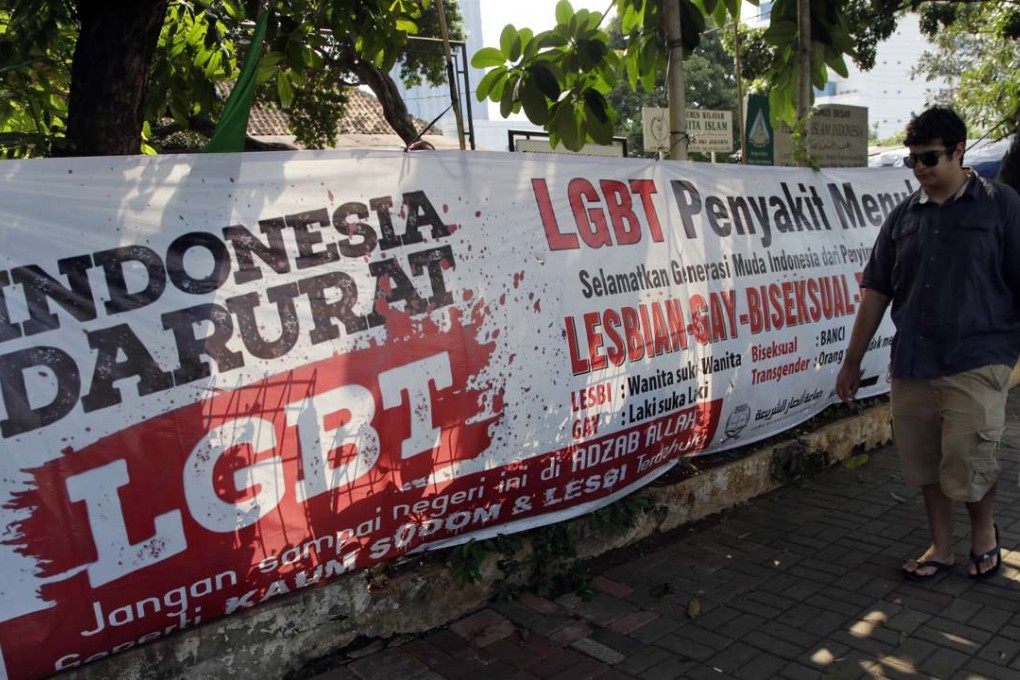 An anti-LGBT banner erected by an ultra-conservative Islamic group in Jakarta. Indonesia's Constitutional Court is considering whether to make gay sex a crime after accepting a judicial review petition from Islamic activists.Photo: AP