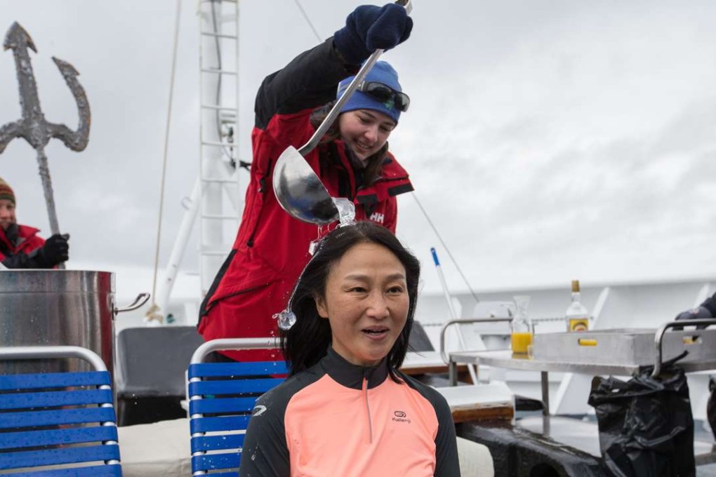 Beijinger Cindy Li undergoes the ice bucket challenge aboard a cruise ship in Antarctica. Photos: Daniel Allen