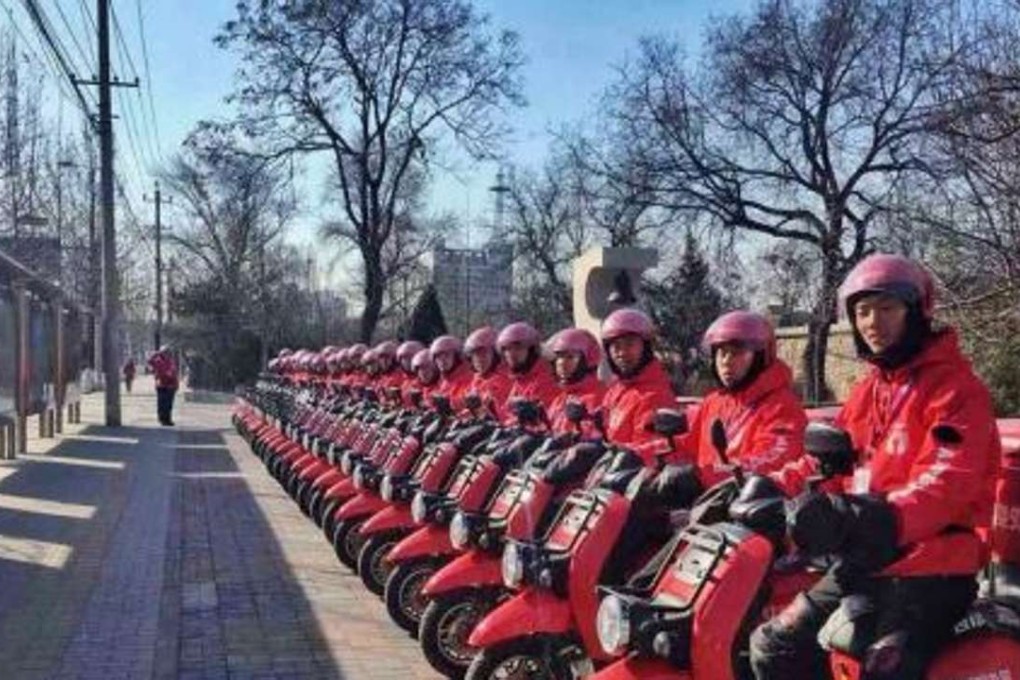 Riders for online food delivery service Waimai line up ready for orders. Photo: SCMP Pictures