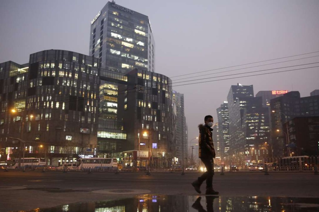 A non-Beijing Chinese resident must be formally employed and paying into local social security funds, including pensions, health care and housing, for seven years continuously before he or she is qualified to apply for permanent residency. Photo: EPA