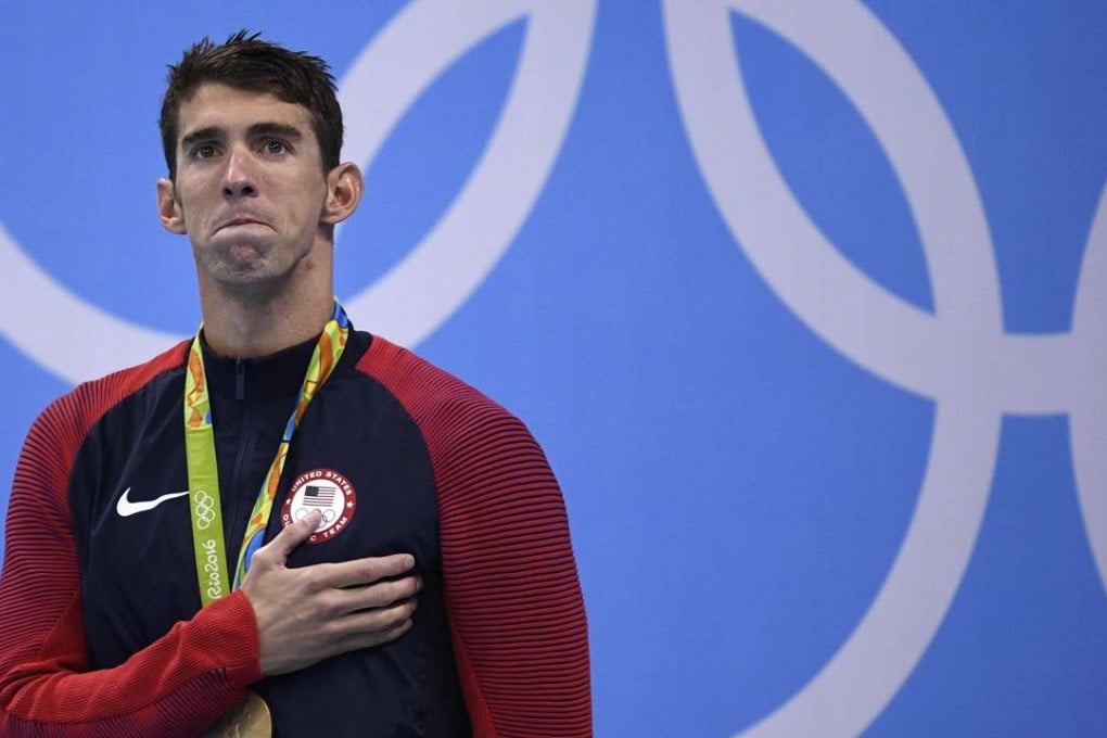 USA’s Michael Phelps has made history again after becoming the first swimmer to win the same event at four consecutive Games. Photo: AFP