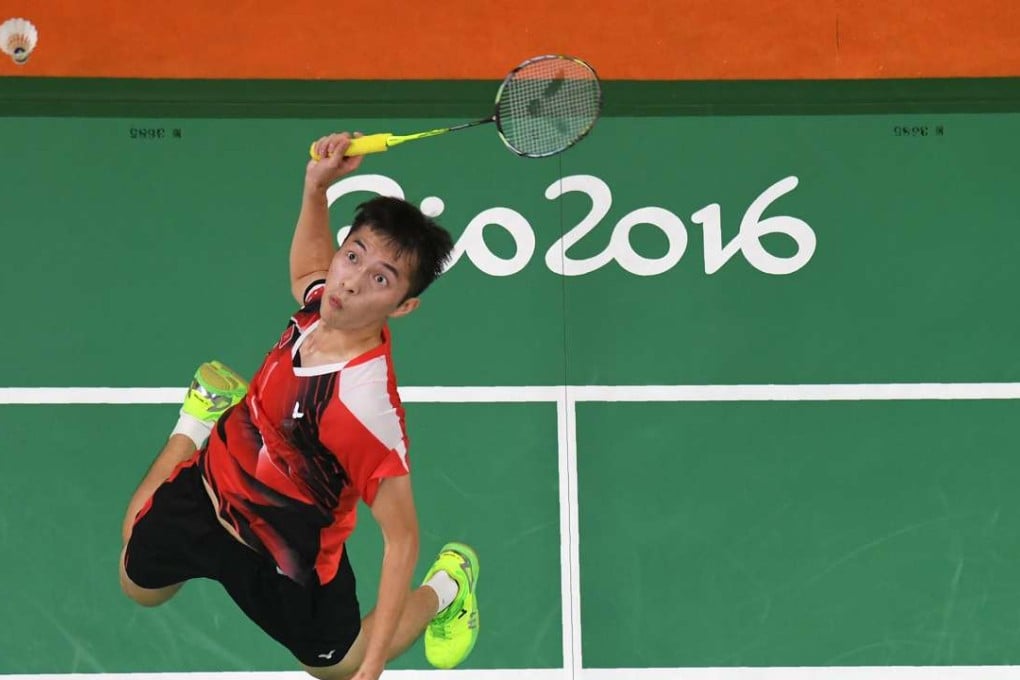 Hong Kong’s Angus Ng Ka-long returns against Canada’s Martin Giuffre during his singles qualifying win on Thursday. Photo: AFP