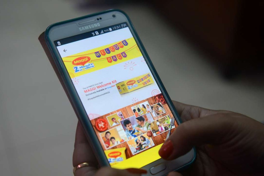 A woman registers on the e-commerce website Snapdeal for the Maggi Noodles 'Welcome Kit', in Siliguri. Snapdeal.com says it has raised US$500 million from investors including Alibaba and Foxconn. Photo: AFP