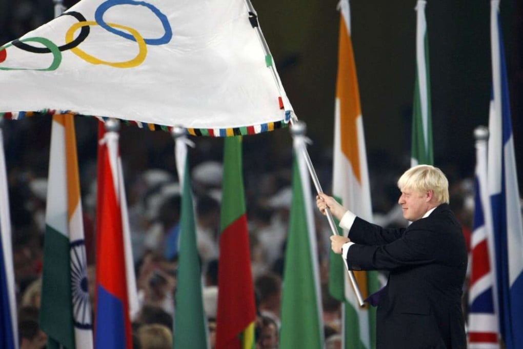 Then London mayor Boris Johnson waves the Olympic flag during the closing ceremony in the National Stadium at the 2008 Olympic Games in Beijing. Photo: Reuters