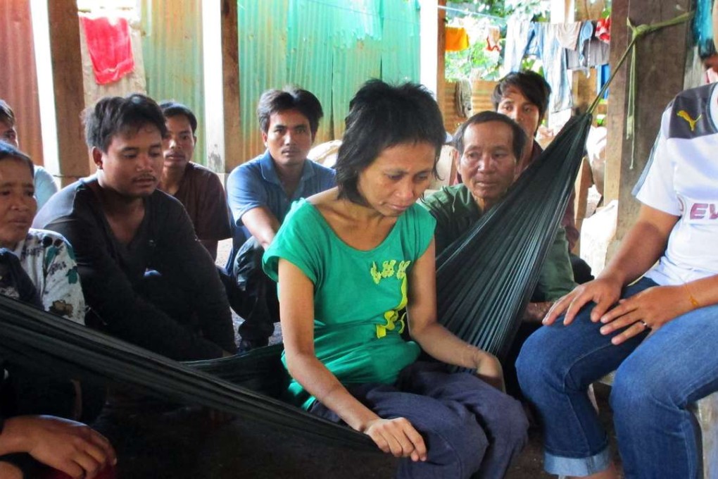 Rochom P’ngieng (centre). Photo: AFP