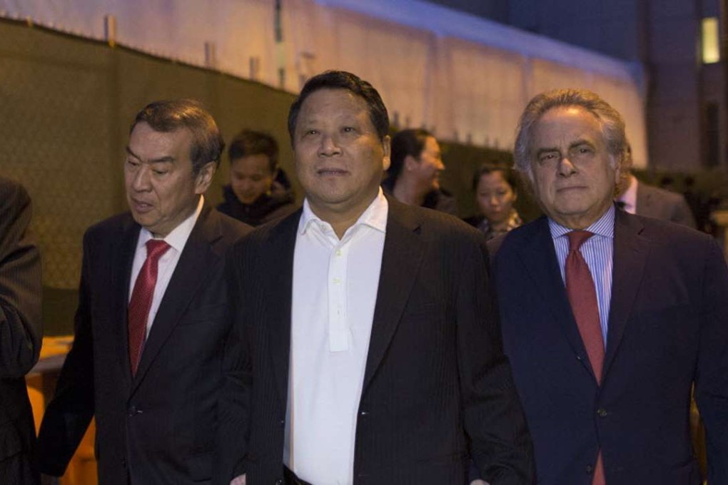 Ng Lap Seng (centre) is escorted outside a court in New York in October. Photo: Reuters