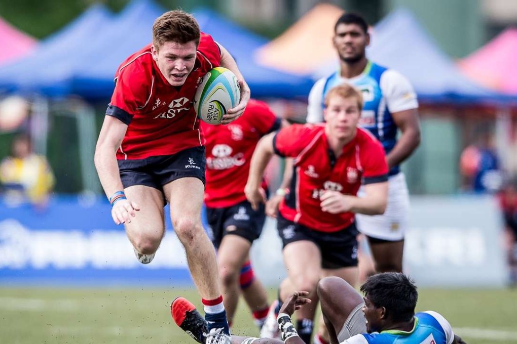 Liam Herbert scores in the semi-final as Hong Kong won round two of the Asia Rugby U20 Sevens Series. Photos: SCMP Pictures