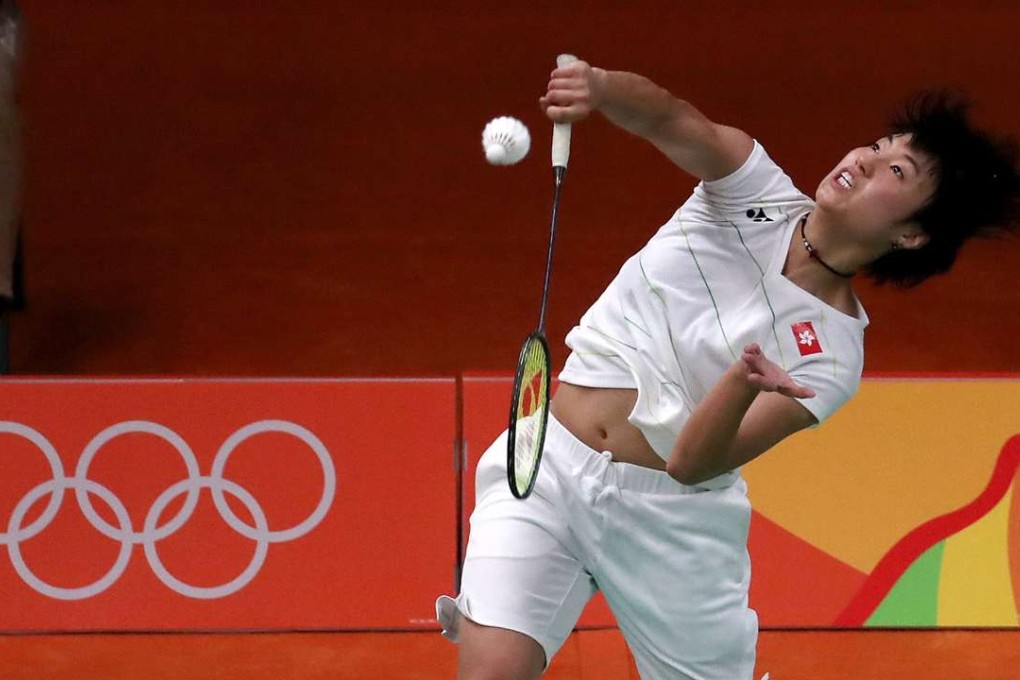 Hong Kong's Yip Pui-yin wears all white in her defeat against Thailand's 2013 world champion Ratchanok Intanon. Photo: EPA