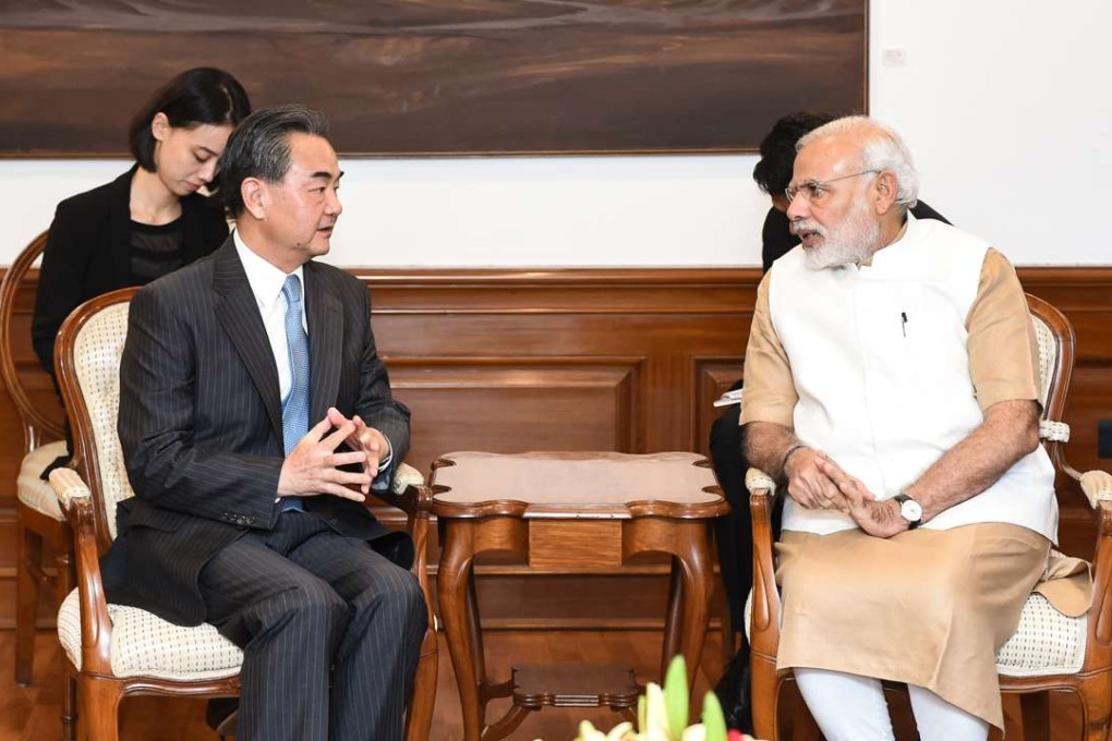 Foreign Minister Wang Yi meets Indian Prime Minister Narendra Modi in New Delhi on Saturday. Photo: Xinhua