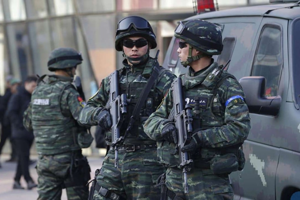Armed policemen with the Snow Leopard Commando Unit on patrol in Beijing in December, 2015, Photo: Reuters