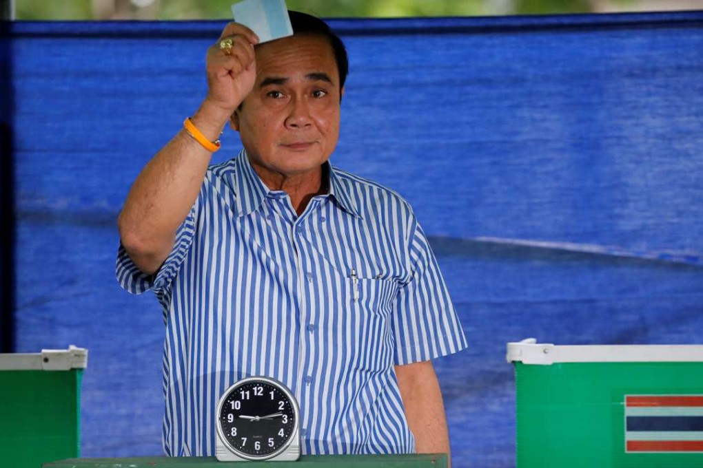 Thai Prime Minister Prayuth Chan-ocha casts his ballot. Photo: Reuters