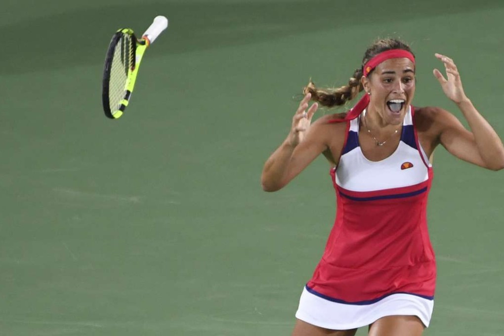 Puerto Rico’s Monica Puig reacts after winning the women’s tennis singles final. Photo: AFP