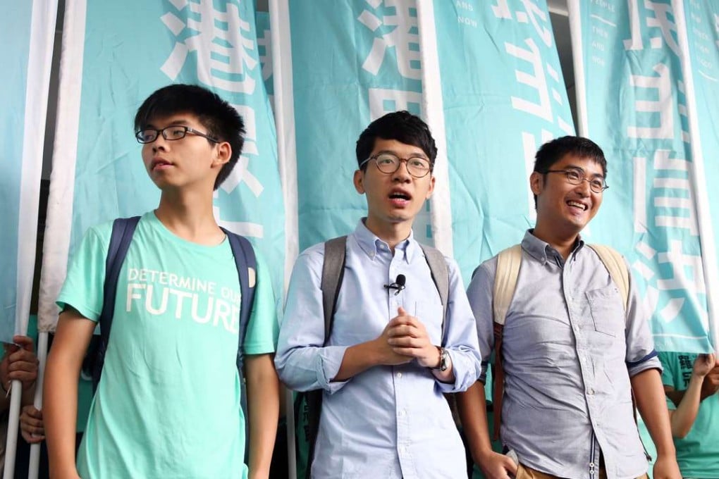 Joshua Wong Chi-fung, Nathan Law Kwun-chung and Alex Chow Yong-kang appearing outside Eastern Court in Sai Wan Ho on Monday. Photo: Sam Tsang