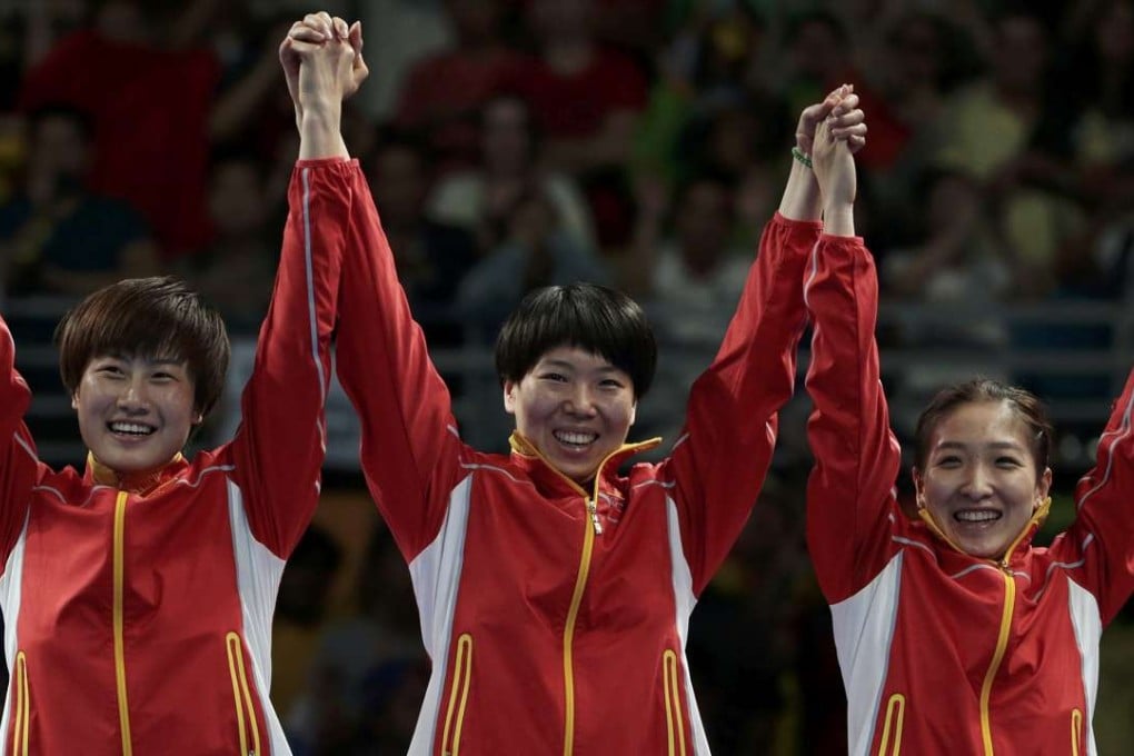 Ding Ning, Li Xiaoxia and Liu Shiwen deliver the team gold for China – as expected. Photo: Reuters