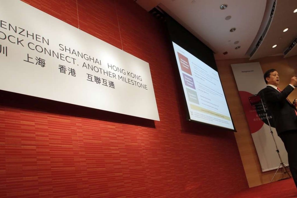 Hong Kong Exchanges and Clearing chief executive Charles Li speaks during a press conference on Shenzhen-Hong Kong Stock Connect on Tuesday. China's Cabinet approved the initiative that will give foreign investors more access to Chinese stocks by linking exchanges in Hong Kong and Shenzhen. Photo: AP