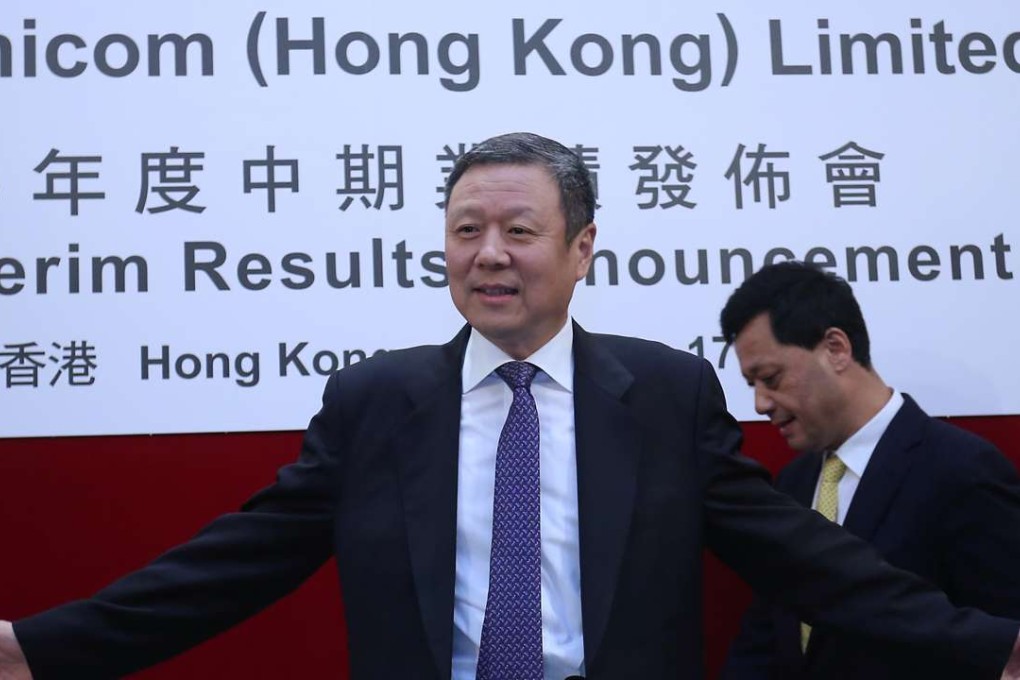 China Unicom chairman Wang Xiaochu (L), and chief financial officer Li Fushen, at the company’s interim results announcement in Hong Kong on Wednesday. Photo: May Tse