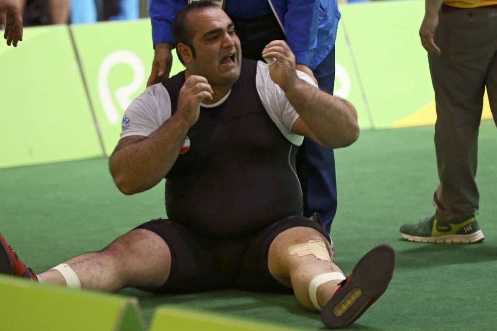 Behdad Salimikordasiabi of Iran cannot believe the judges’ decision. Photo: Reuters